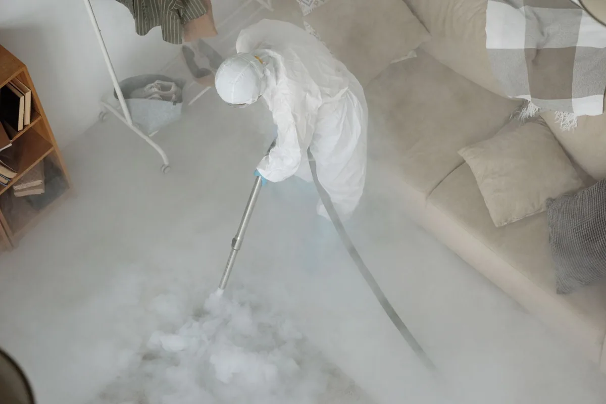 Biohazard cleanup technician in protective equipment, Palm Coast, FL